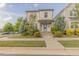 Charming two-story home with landscaped yard, greenery, and well-manicured lawn at 1624 Tunnel St, Wendell, NC 27591