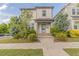 Charming two-story home with landscaped yard, greenery, and well-manicured lawn at 1624 Tunnel St, Wendell, NC 27591