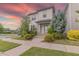 Charming two-story home featuring a well-manicured lawn and mature landscaping at 1624 Tunnel St, Wendell, NC 27591