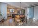 Eat-in kitchen featuring stainless steel appliances, granite counters, a large island, and an adjacent dining area at 1624 Tunnel St, Wendell, NC 27591