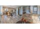Bright, open living space with hardwood floors, connecting the living room to the kitchen and staircase at 1624 Tunnel St, Wendell, NC 27591