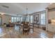 Open-concept living room with hardwood floors, natural light, and modern furnishings, creating a warm and inviting space at 1624 Tunnel St, Wendell, NC 27591
