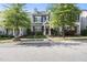 Charming two-story home with well-manicured front yard, mature trees, and inviting curb appeal at 1625 Main Divide Dr, Wake Forest, NC 27587