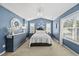 Serene main bedroom featuring vaulted ceiling, stylish furnishings, and lots of natural light at 1625 Main Divide Dr, Wake Forest, NC 27587