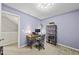 Cozy office featuring stylish desk, comfortable chair, and ample storage space at 1625 Main Divide Dr, Wake Forest, NC 27587