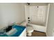 Bright bathroom featuring a shower-tub combination and a vanity with a granite-like countertop at 168 Clayton Rd, Princeton, NC 27569