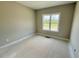 Bedroom with neutral paint and bright window with scenic outside view at 168 Clayton Rd, Princeton, NC 27569
