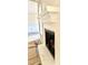 Detailed view of a sophisticated fireplace mantel with wood burning insert and trim at 168 Clayton Rd, Princeton, NC 27569