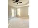 Bright main bedroom with tray ceiling, featuring ample light and easy access to the backyard at 168 Clayton Rd, Princeton, NC 27569