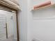 Walk-in closet with plenty of storage space and a full-length mirror to the side at 1804 Amberly Ledge Way, Cary, NC 27519