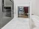 The laundry area leads to a walk-in closet at 1804 Amberly Ledge Way, Cary, NC 27519