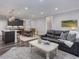 Spacious open-concept living room with kitchen and dining area at 1804 Amberly Ledge Way, Cary, NC 27519
