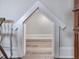 Play area featuring a creative custom built-in pet area and hardwood flooring at 1804 Amberly Ledge Way, Cary, NC 27519