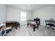 Bedroom with neutral carpet that has a table, foosball table, keyboard and other toys at 200 Sweet Violet Dr, Youngsville, NC 27596