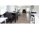 Open living space showcasing an eating area flowing into the living room at 200 Sweet Violet Dr, Youngsville, NC 27596