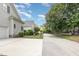 View of the driveway from the side of the house, looking down the street at 2027 Hopeton Ave, Raleigh, NC 27614