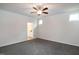 Spacious bedroom with carpet flooring, natural light, and ensuite bathroom access at 209 Stone River Dr, Wendell, NC 27591