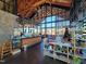 Inviting cafe with high ceilings, large windows, and cozy seating areas at 209 Stone River Dr, Wendell, NC 27591