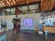 Large open interior with stone wall, high ceilings, and modern decor at 209 Stone River Dr, Wendell, NC 27591