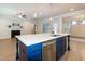 Modern kitchen featuring an island with stainless steel sink and stainless steel appliances at 209 Stone River Dr, Wendell, NC 27591