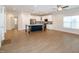 Spacious living area with an open floor plan, kitchen island, and modern appliances at 209 Stone River Dr, Wendell, NC 27591