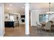 Open-concept living area showcases the kitchen, dining, and fireplace, perfect for modern living at 209 Stone River Dr, Wendell, NC 27591