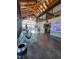 Spacious lobby with high ceilings, stone wall, bikes, and large windows at 209 Stone River Dr, Wendell, NC 27591