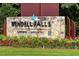 Wendell Falls community entrance sign showcasing the development's branding and established neighborhood appeal at 209 Stone River Dr, Wendell, NC 27591