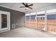 A spacious screened-in porch has access to the backyard and an outdoor space at 209 Stone River Dr, Wendell, NC 27591