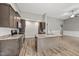 Stylish kitchen with granite countertops, stainless steel appliances, and adjacent dining area at 241 Fox Run, Benson, NC 27504