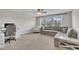 Bonus room with window, sofa, desk and chair at 243 E Wellesley Dr, Clayton, NC 27520