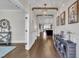 Hallway featuring wood floors, recessed lighting and decorative furnishings at 243 E Wellesley Dr, Clayton, NC 27520