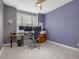 Bedroom or office with multiple monitors and neutral-toned carpet at 244 Elmcrest Dr, Holly Springs, NC 27540