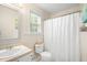 Bathroom featuring a vanity with sink, toilet, and shower with curtain at 2445 Sapphire Valley Dr, Raleigh, NC 27604