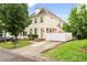 Charming two-story home with a well-manicured lawn, inviting curb appeal, and private gated area at 2445 Sapphire Valley Dr, Raleigh, NC 27604