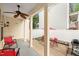 This covered patio features a ceiling fan and outdoor furniture for relaxing or entertaining at 2445 Sapphire Valley Dr, Raleigh, NC 27604