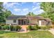 Spacious backyard with a shed, patio, porch, and mature landscaping at 281 Kinsman Ct, Fuquay Varina, NC 27526