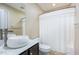 Bathroom with a toilet, a sink, vanity, and a shower with a white curtain at 281 Kinsman Ct, Fuquay Varina, NC 27526
