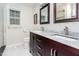 Bathroom features double vanity, granite countertops, and ample storage space at 281 Kinsman Ct, Fuquay Varina, NC 27526