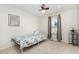 Bright bedroom with a ceiling fan, window, and a cozy bed, creating a relaxing atmosphere at 281 Kinsman Ct, Fuquay Varina, NC 27526