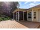 Inviting rear deck with screened-in porch, ideal for outdoor living and entertaining at 281 Kinsman Ct, Fuquay Varina, NC 27526