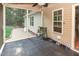 Relaxing screened porch with ceiling fan and outdoor access, perfect for enjoying nature at 281 Kinsman Ct, Fuquay Varina, NC 27526