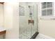 Modern shower features glass enclosure, tile surround, and built-in seating at 281 Kinsman Ct, Fuquay Varina, NC 27526