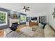 Cozy living room with fireplace, built-in shelving, and a comfortable sectional sofa at 2933 Creek Moss Ave, Wake Forest, NC 27587