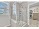 Contemporary shower with glass doors at 2969 Thirlestane Dr, Apex, NC 27502