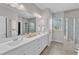 Bathroom with double sinks and a walk-in shower at 2969 Thirlestane Dr, Apex, NC 27502