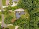 A beautiful home with a sprawling yard surrounded by mature trees and professional landscaping at 305 Lochridge Dr, Roxboro, NC 27573