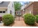 Charming courtyard and patio with brick pathway at 305 Lochridge Dr, Roxboro, NC 27573