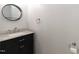 Powder room featuring a modern vanity with marble countertop and stainless steel fixtures at 3110 Trinness Dr, Durham, NC 27707