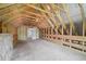 Spacious attic, featuring natural light and wooden beams at 33 Bluestone Dr, Smithfield, NC 27577